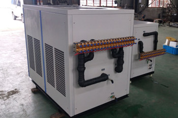 两台用于注塑机模具冷却的工业冷水机顺利出厂运行良好